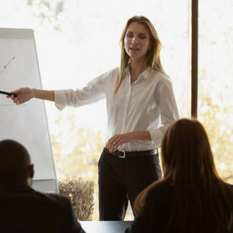Woman in meeting giving a presentation