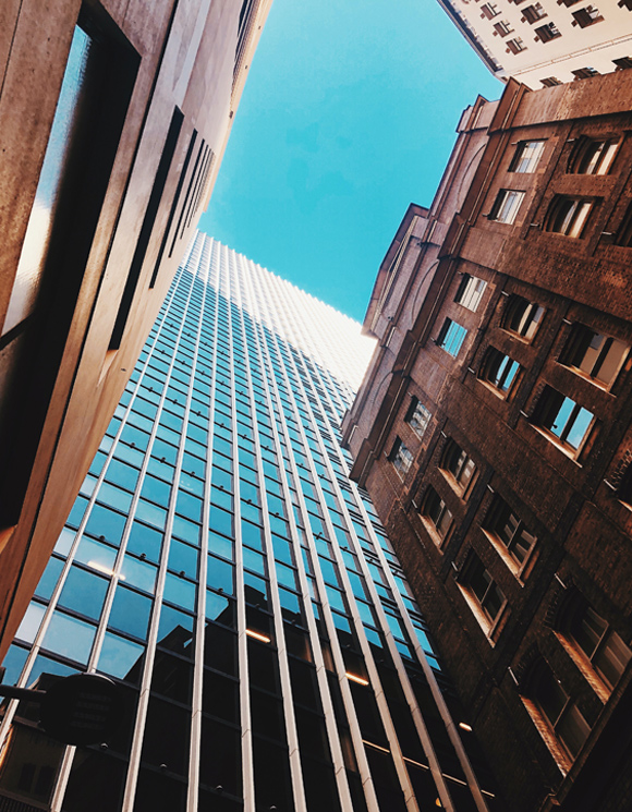 View between buildings looking toward the sky